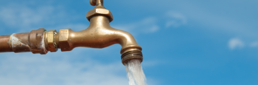 Water coming out of a faucet